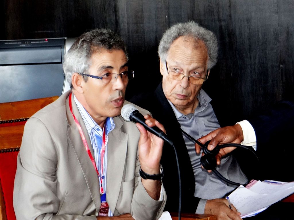 Séminaire ACM — Un intervenant prend la parole au microphone pendant le séminaire.